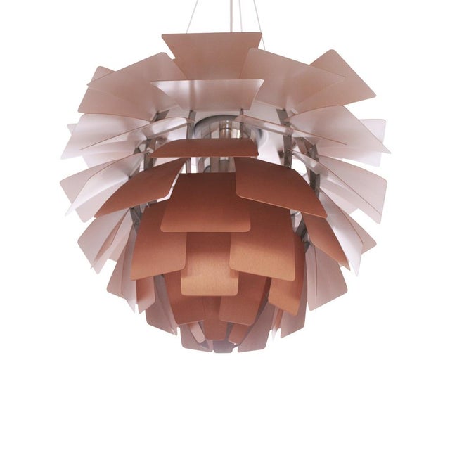 The ph artichoke lamp, designed by poul henningsen for louis poulsen in 1958, is one of the most iconic and recognizable...