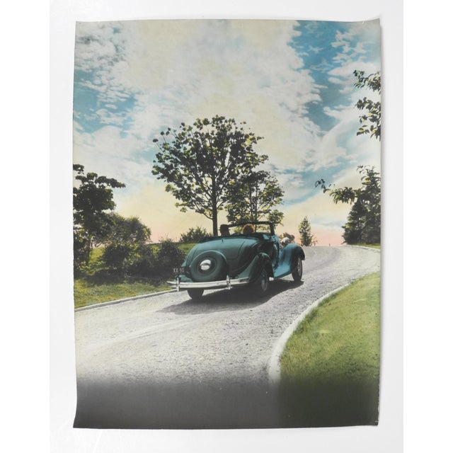 Early 20th century colortone advertising photograph of a 1930's blue roadster convertible. Unsigned. Unframed, edge and...