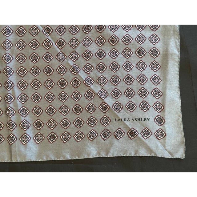 Made in Italy, this vintage Laura Ashley textile has a classic full drop block pattern repeat in plum, purple and dove...