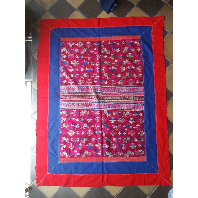 A vintage 1970's hand embroidered silk bed cover. Made from hemp and silk by the Miao hill tribe people.