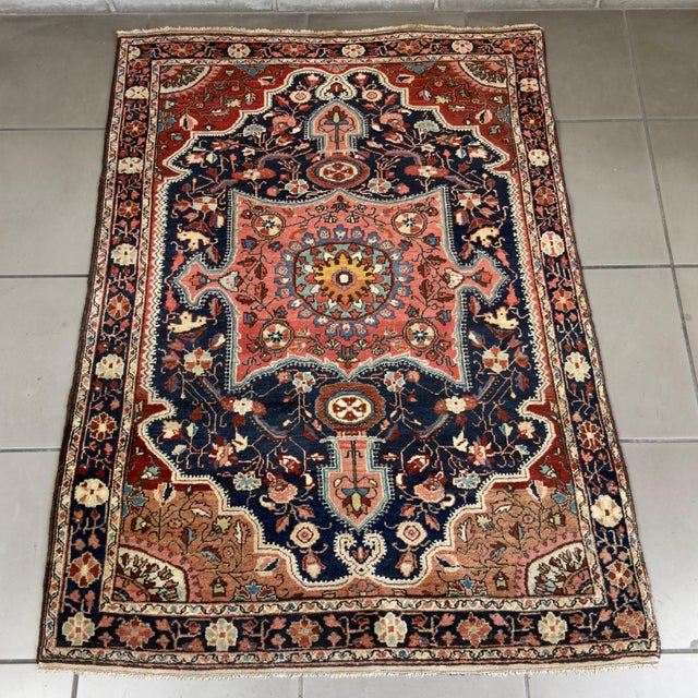 A magnificent and rare vintage oriental textile, attributed to the prestigious 19th-century Persian Malayer manufacturer....