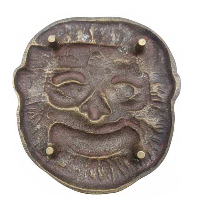 A charming English cast brass shallow dish depicting Father Christmas (or Santa Claus) in bold high relief. This whimsical...