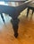 The rectangular extension table is crafted from solid mahogany with a rich espresso finish. It features beautifully turned...