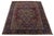 This hand-knotted wool rug is an exquisite antique from the 1900s. Its enchanting floral design in multiple colors...