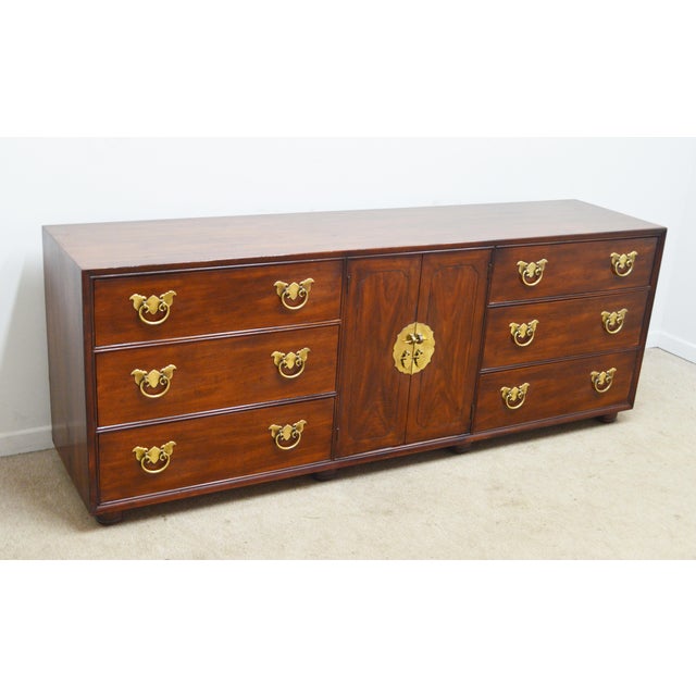 Standard Dresser by Henredon. Store item #555. It features dovetailed drawers and comes with protective glass top (needs...