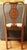 Circa 1900 Georgian Revival Style Side Chair. Mahogany with elaborately carved floral rondel backsplat. Raised on square...