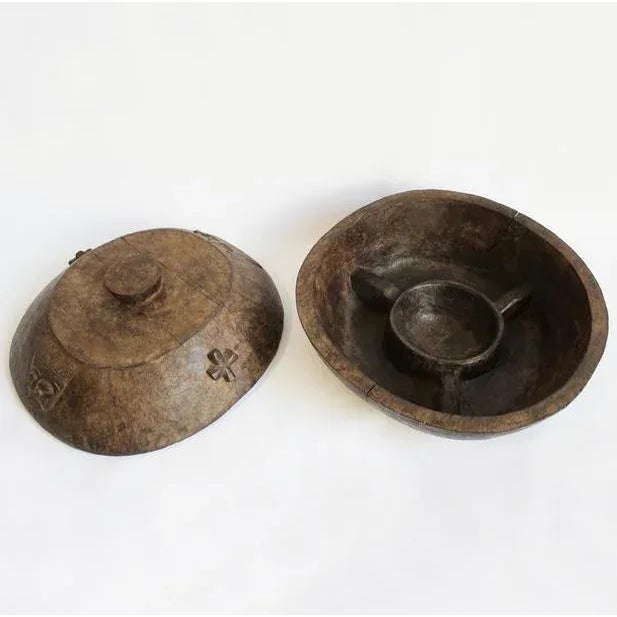 Original wood carved Yoruba tribal bowl with rare Christian cross symbol used for food display in ceremonies. Circa 1950.