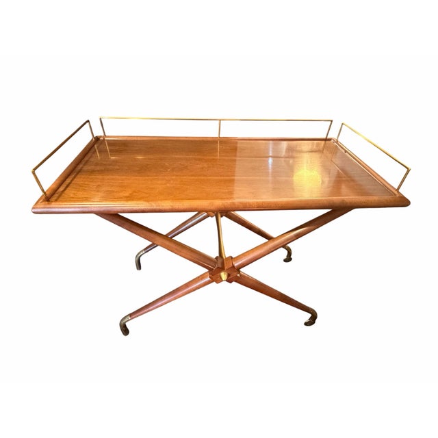A refined Hackney-style bar cart attributed to the esteemed American maker Hickory Chair. Designed with a classic blend of...