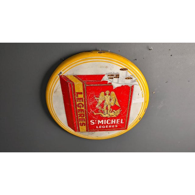 Striking enamel sign for St Michel cigarettes originally hand painted enamel sign. Dated 1953 - Emaillerie Belge -...