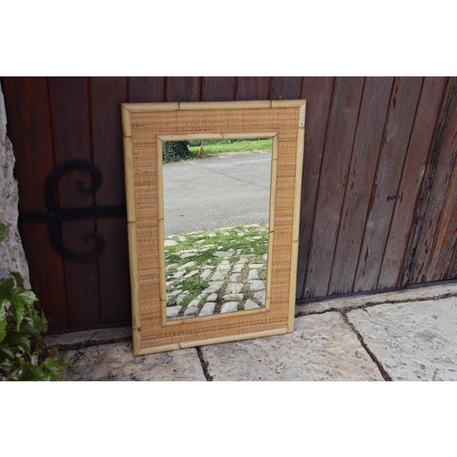 Rectangular bamboo and rattan mirror in a bohemian style. Vintage 1960s/1970s. Made by the Italian brand Dal Vera,...