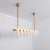 Brass linear chandelier 16 by schwung dimensions: w 182 x d 31 x h 132 cm materials: brass, frosted glass schwung is a...