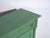 Rustic three-drawer chest in pine wood, polychromed in green and originating from the Tyrolean–Central European tradition,...