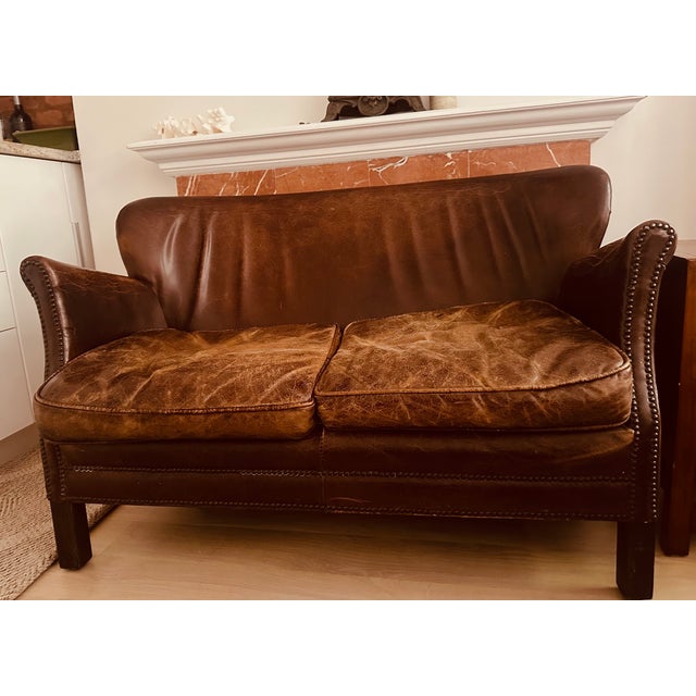 Restoration Hardware Professor's Leather Settee with nailhead details and vintage patina. Sturdy and comfortable with a...