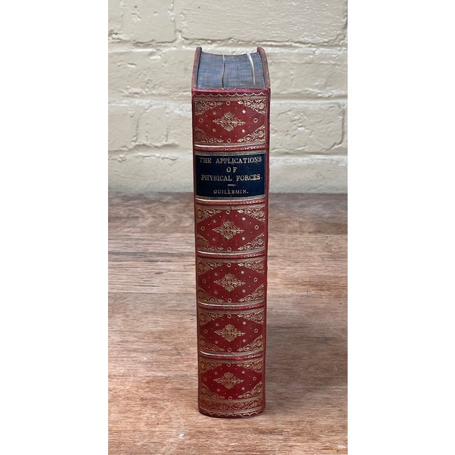 A remarkable piece of Victorian scientific history, this beautifully bound 1877 edition of The Applications of Physical...