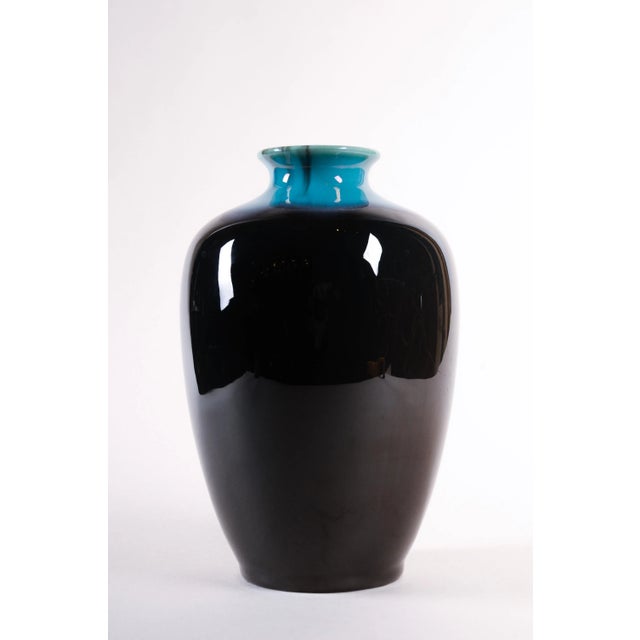 Rookwood Glaze Effect Vase. Signed and dated on bottom. 1993. Special Shape. Grey-Blue Size: 7.25" H x 5" D x 5" W Founded...