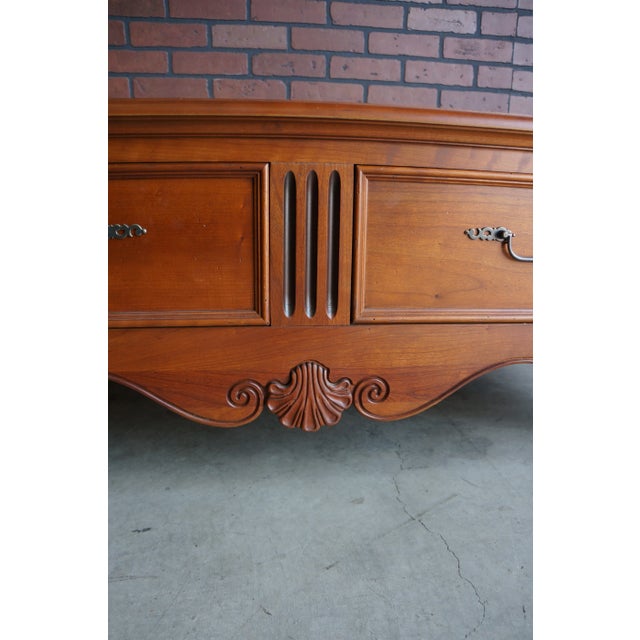 Inspired by French provincial designs, this coffee table showcases that perfectly. Finely crafted of Cherry from the...