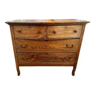 Early 1900’s Oak Serpentine Dresser With Brass Hardware For Sale