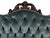 VICTORIAN COURTING SETTEE. New button tufted upholstery in an elegant gray velvet. American, 19th century. Carved...