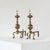 Pair of Large Neoclassical Andirons in Patinated Brass. Europe, mid to late 19th century. A large and imposing pair of...