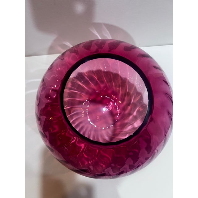 The piece a near-perfect sphere with an optic ripple texture throughout the surface. The glass is thick and substantial,...