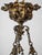 This neo-Gothic six-arm candle chandelier is a beautiful example of historical design. The chandelier is made of bronze...