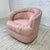 This chair features a barrel shaped back with a 1980s style plush pink ruched upholstery detailing. This chair has a 360...