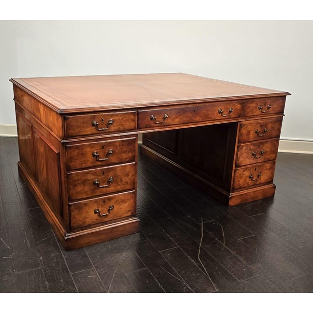 An early 19th-century English partners desk. 24.75" knee.