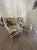 Bring timeless Palm Beach Regency style to your outdoor living space with this elegant wrought iron set of chairs....