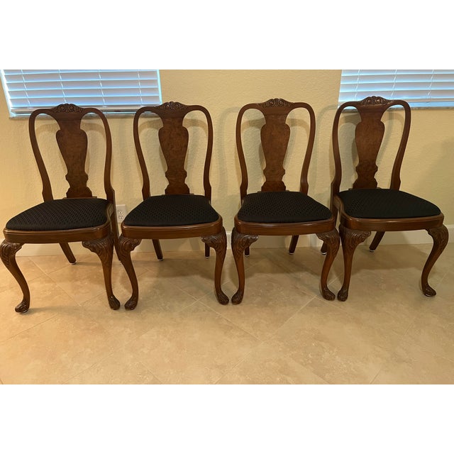 Own a gorgeous piece of history and add elegance to any room. A set of four of hand-made antique English Queen Anne chairs...