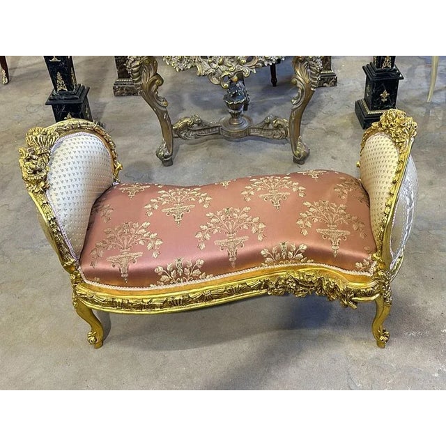 Stunning lovely pink and white bench/settee. This is fully refinished in gold and tufted in high end designer fabric. The...