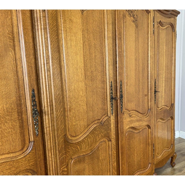 Gold Vintage Louis XVI French Oak Four Door Carved Armoire For Sale - Image 8 of 11