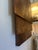 Large-scale dimensional wall art composed of layered painted canvases. The stacked composition creates depth and shadow,...