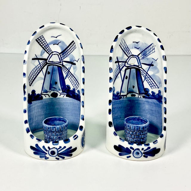 A lovely pair of Delft Ceramic Wall Sconces Candleholders. They are from the Holland region of the Netherlands. We love...