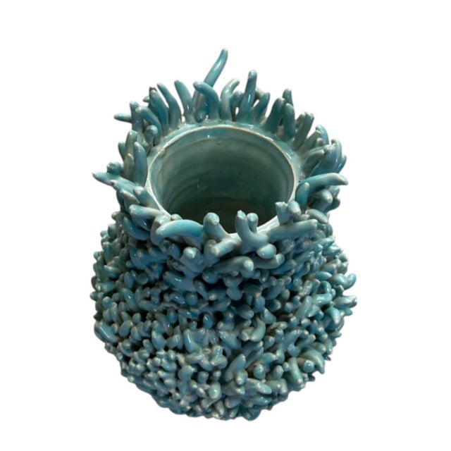 This striking vintage Italian ceramic vase is a masterful blend of organic art and sculptural pottery design. Rendered in...