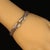 Elegant 7.5-Inch Sterling Silver Link Bracelet with Goldy Accents Elevate your accessory game with this stunning 7.5-inch...