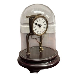 Skeleton Clock in Case with Swinging Monkey Pendulum For Sale