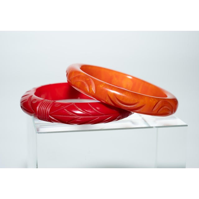 Vintage Carved Bakelite Bangle Bracelets in Red and Orange, 1930's, Pair Of For Sale - Image 9 of 17