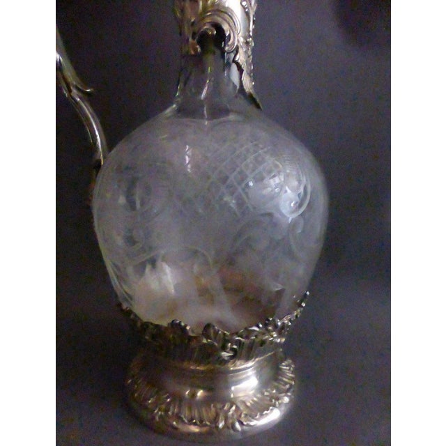 Ewer brace punch silver and engraved crystal. Dimensions: 26 cm high. I have official proof of authenticity such as...