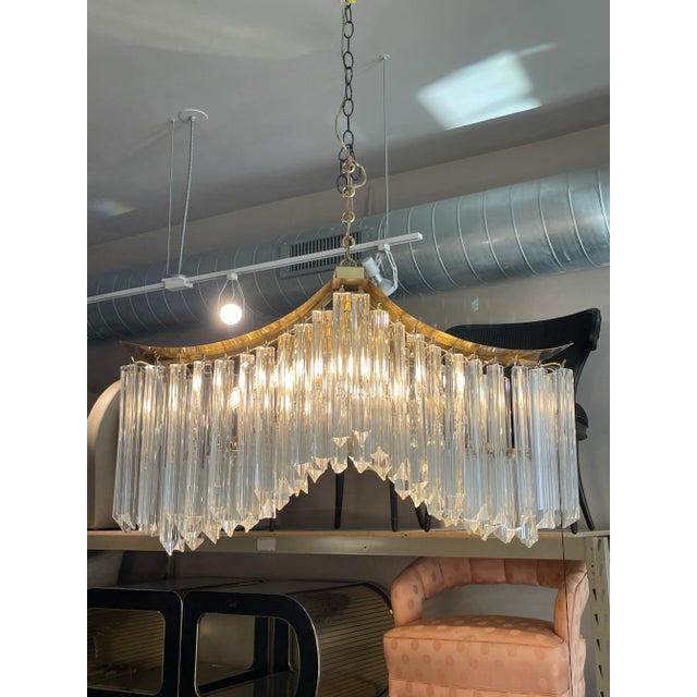 Oooh this is a good one! The shape is a showstopper and the glass crystals add the perfect amount of shine. Please note...