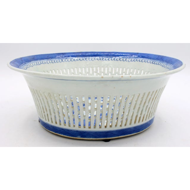 Circa 1830-60 Blue Canton reticulated chestnut basket, Chinese export. Fine condition, one bottom glaze flaw. Qing...