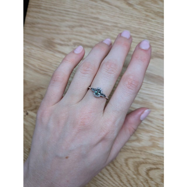 A gemstone like no other—this color-changing Alexandrite captivates with its shifting tones, beautifully complemented by...