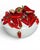 A striking Italian ceramic chili pepper tureen featuring a sculptural lid bursting with glossy red peppers and usable as...