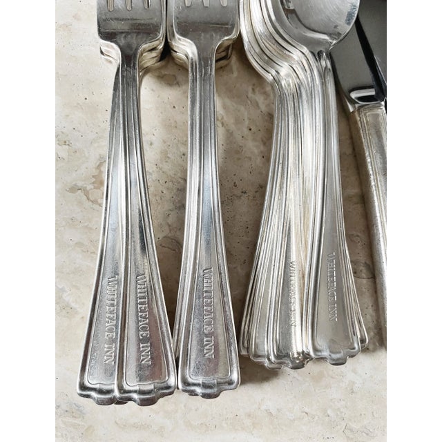 A service for eight of lovely antique circa early 1900s silver plated flatware from the historic Whiteface Inn on Lake...