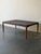 Striking large Danish Mid-Century Modern coffee table, crafted from richly figured rosewood. The expansive tabletop...