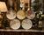 An exceptional and remarkably cohesive set of five antique French Limoges porcelain cabinet plates, each individually...