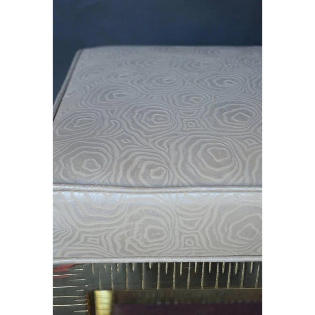 Brass bench with rose imprinted leather.