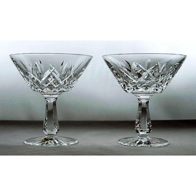 Pair Waterford cut crystal champagne/tall sherbet glasses in the Rosslare pattern.