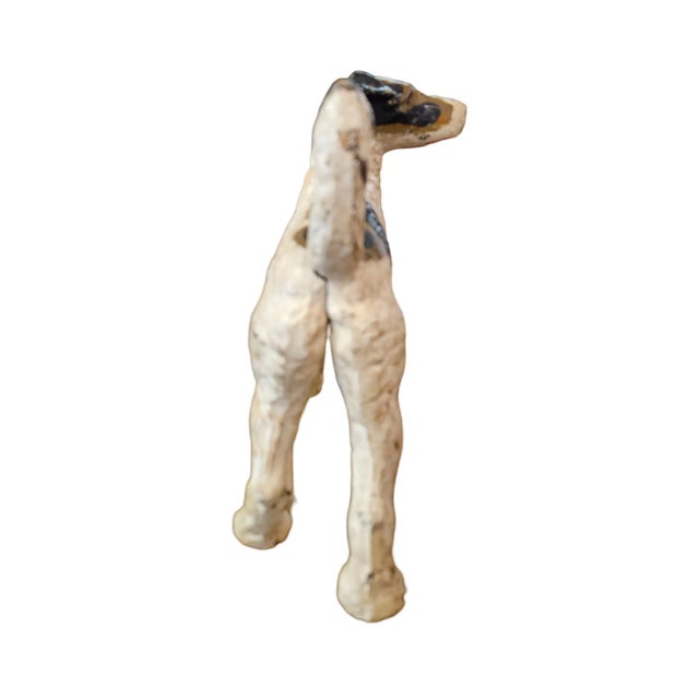 Vintage Hubley Cast Iron Fox Terrier Doorstop measures 8 inches wide