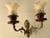These wall lamps are crafted with decorative brass elements and dark brown ceramic stems. Beautiful opal glass shades with...