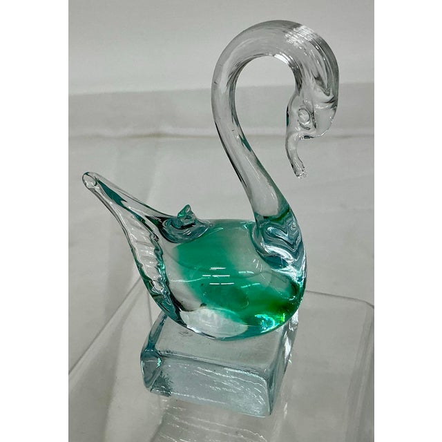 Beautiful vintage Murano glass swan. Clear and brilliant emerald green. No markings.
